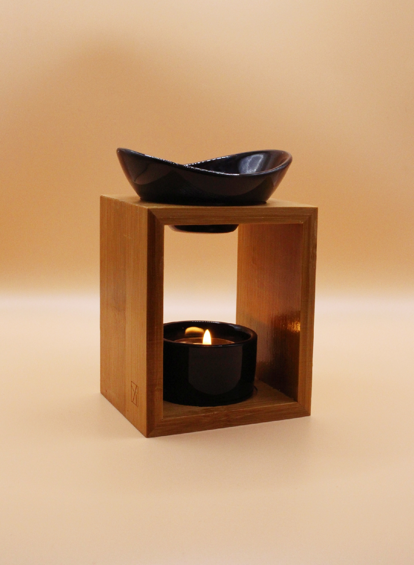 Bruleur pour bougie noir fond orange